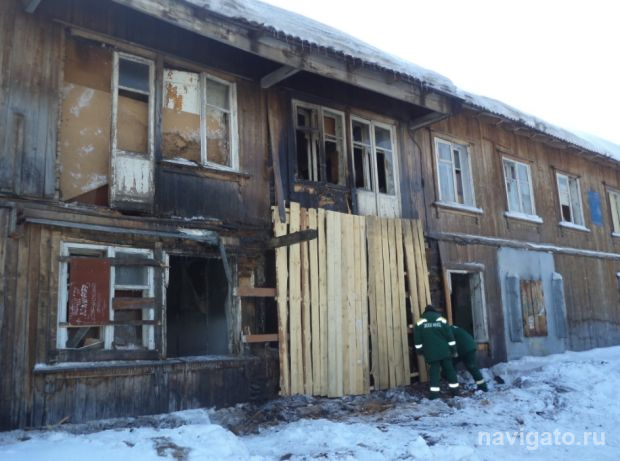 Вход в барак на улице Российской, где на днях был пожар, заколотили
