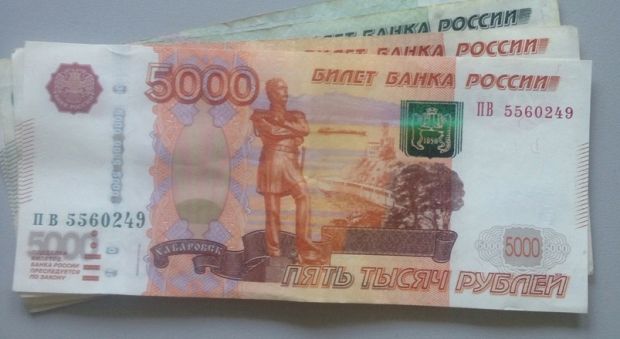 15 фальшивых пятитысячных купюр могут отправить новосибирцев за решетку