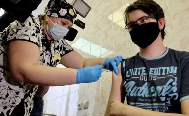 О вакцинации против коронавируса и гриппа расскажут в минздраве